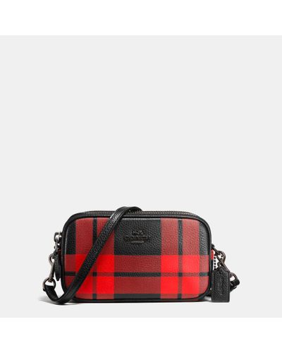 red and black plaid coach purse