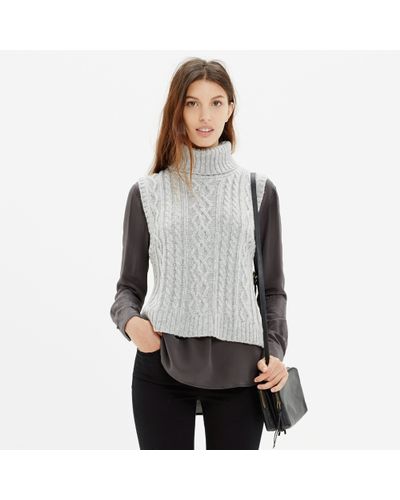 sweater vest with turtleneck underneath