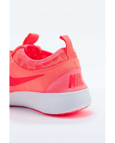 coral nike trainers