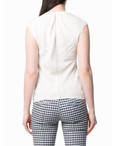 Theory Silk Short-sleeve Fitted Blouse in White - Lyst
