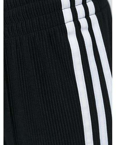 adidas Originals Flared Three Stripe Trousers in Black - Lyst