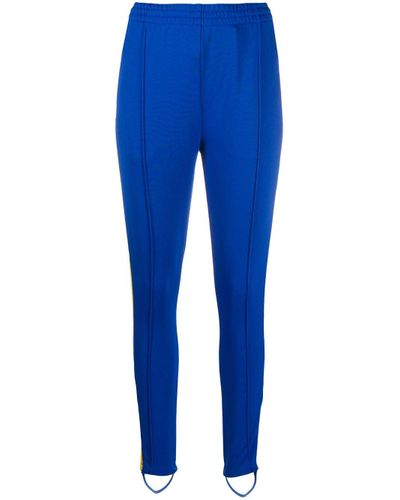 Pantalones de chándal pitillo adidas de Algodón de color Azul | Lyst