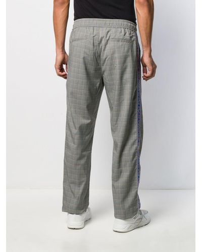 checked track pants