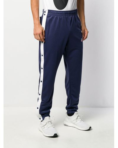 Nike Tearaway Popper Trackpants in Blue 