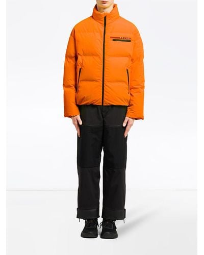 Prada Puffer Jacket in Orange for Men | Lyst UK