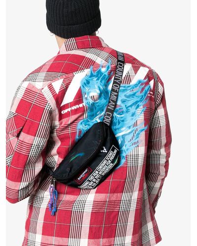 Eastpak Black X Marcelo Burlon County Of Milan Springer Zipped Cross Body  Bag for Men | Lyst