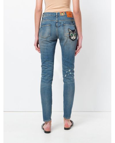 gucci cat jeans