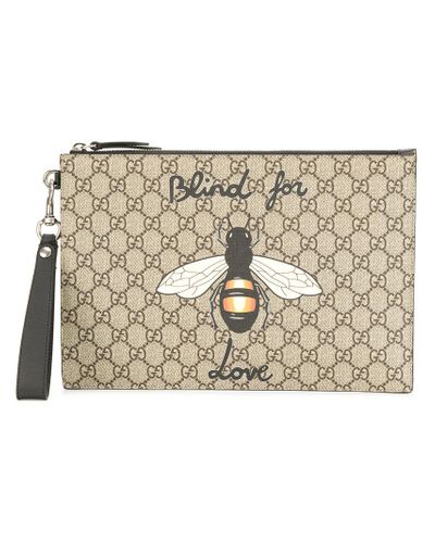 Pochette con ape GG Supreme di Gucci in Neutro | Lyst