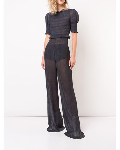 Pantalon palazzo con talla alta de color negro | Andyvil