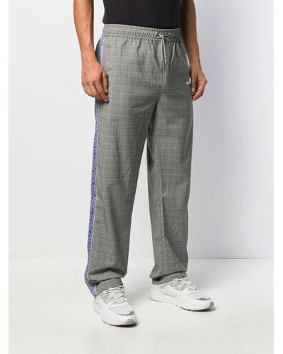checked track pants