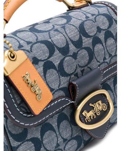 coach riley top handle 22 in signature chambray