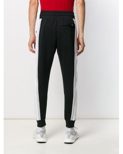 nike striped track pants