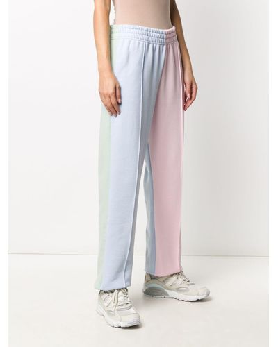 nike colour block joggers in blue and green neutrals