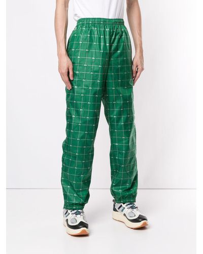 supreme lacoste pants