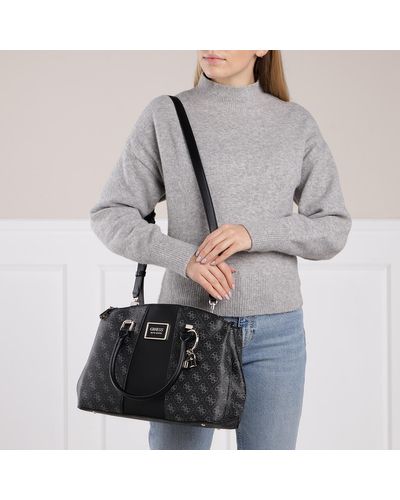 guess tyren status satchel