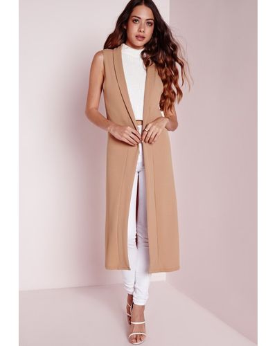 camel sleeveless blazer