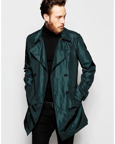 emerald green rain jacket
