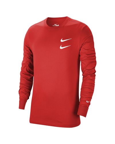 red nike shirt with black swoosh