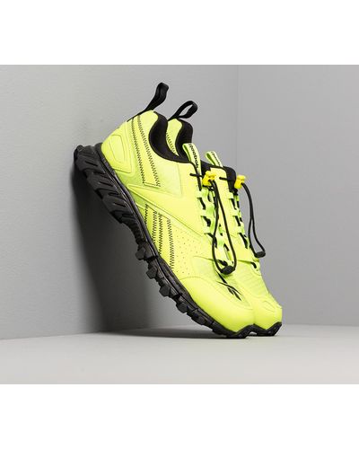 lime green reebok sneakers