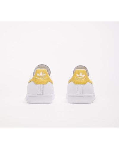 adidas stan smith core yellow