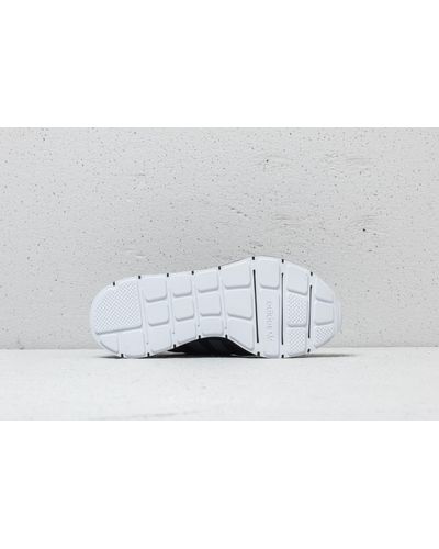 adidas swift run core black carbon white