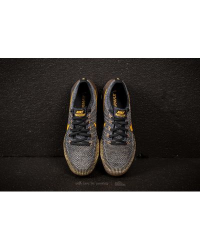 black and gold flyknit vapormax