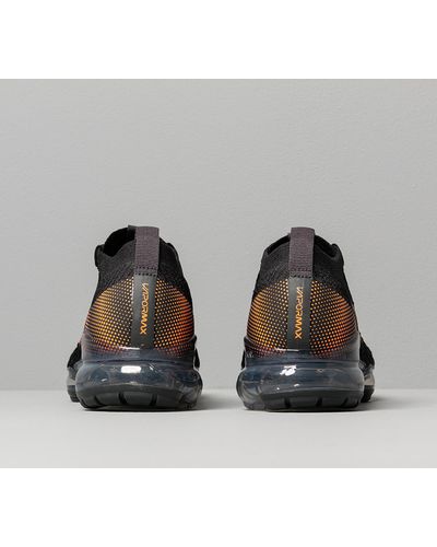 gray and orange vapormax flyknit