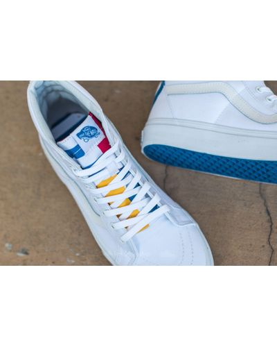 red white and blue high top vans