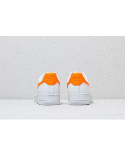 air force ones with orange swoosh