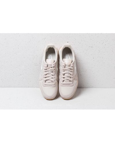 nike internationalist desert sand