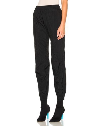 synthetic track pants