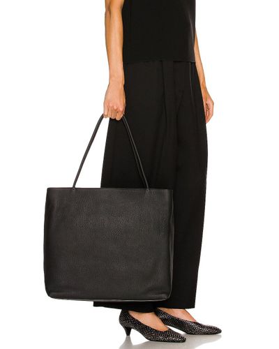 The Row Leather Large Portfolio Bag in Black | Lyst