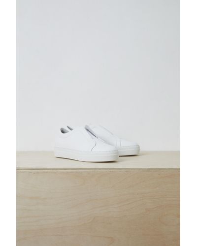 sara elastic slip on trainers french connection