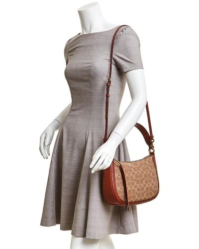coach sutton crossbody tan