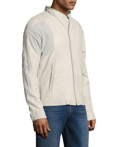 white and gold leather jacket