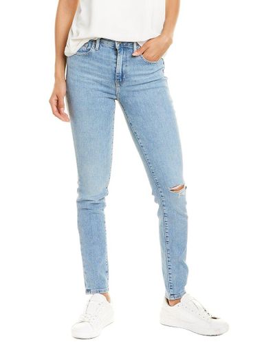 Levi's 721 High-rise Light Wash Skinny Leg Jean in Blue | Lyst