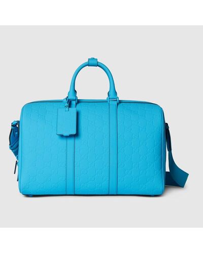 Gucci Bolsa de Viaje Efecto Goma con GG Mediana - Azul