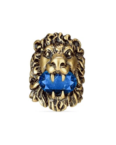 Gucci Anillo con cabeza de león y cristal azul
