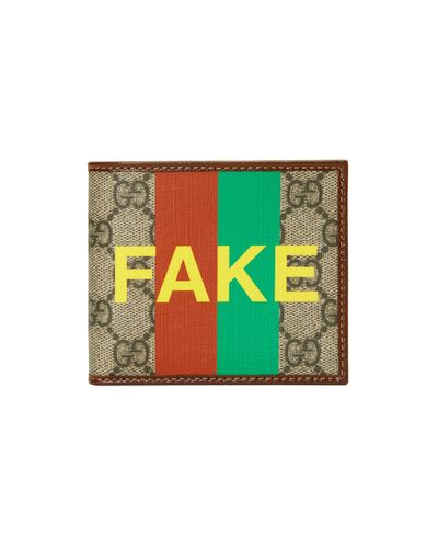 Gucci Portafoglio bi-fold con stampa 'Fake/Not' - Neutro