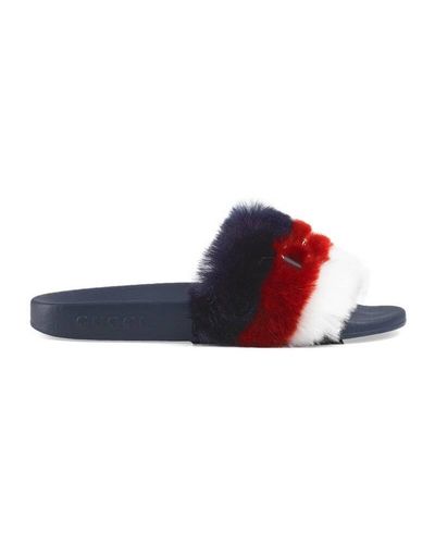fur slides gucci