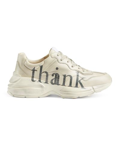 Gucci Rhyton Herrensneaker mit "think/thank"-Print - Weiß