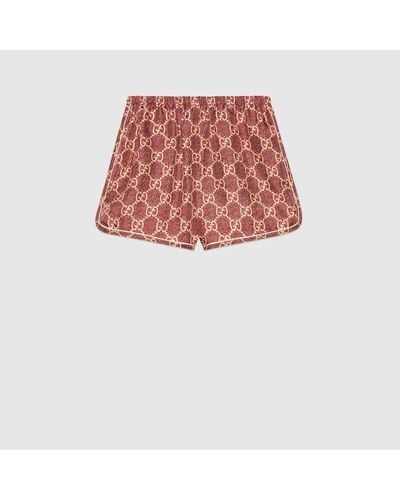 Gucci Shorts Aus Seide Mit GG Supreme-Print - Rot