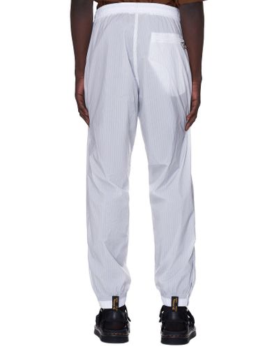 nike pinstripe joggers