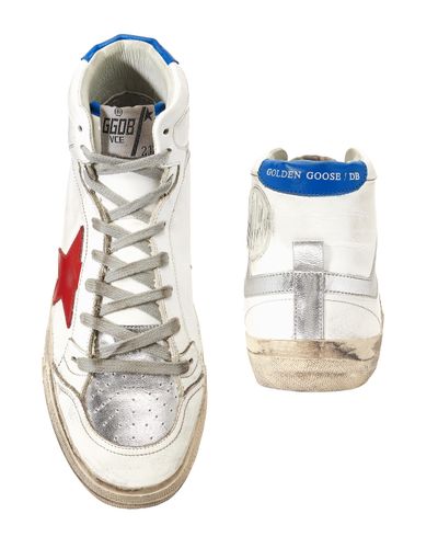 golden goose with red star