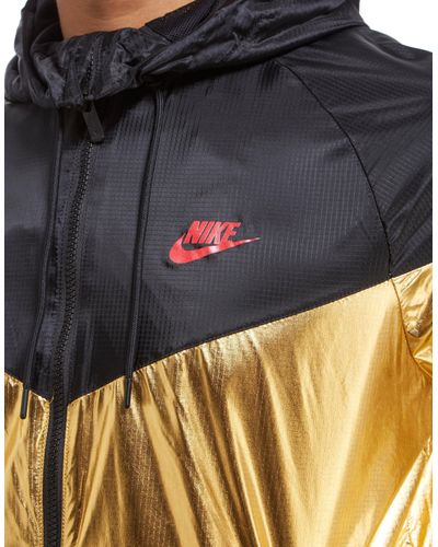 nike windrunner jacket gold