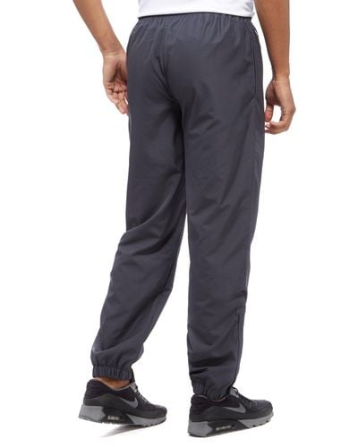Lacoste Synthetic Guppy Track Pants for Men - Lyst