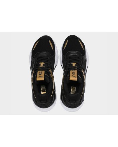 puma rsx trophy gold