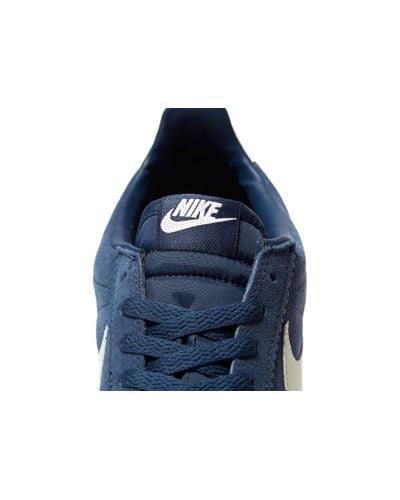 nike cortez navy blue suede