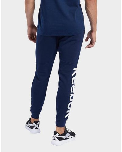 training essentials linear logo joggers