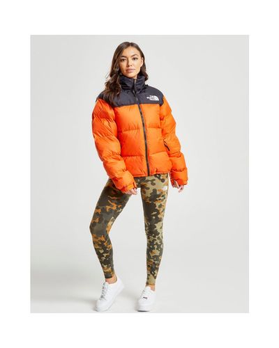 the north face 1996 retro nuptse jacket orange
